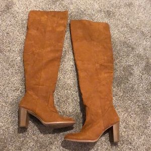 Tan above the knee boots!